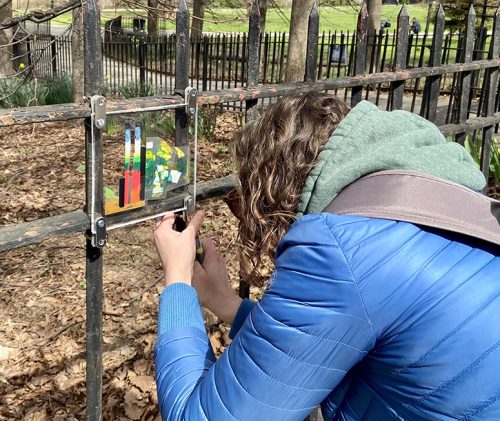 A picture containing person, outdoor, ground, blue Description automatically generated