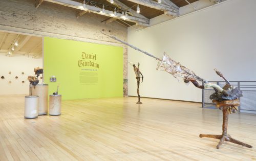 A picture containing wall, indoor, floor, art Description automatically generated