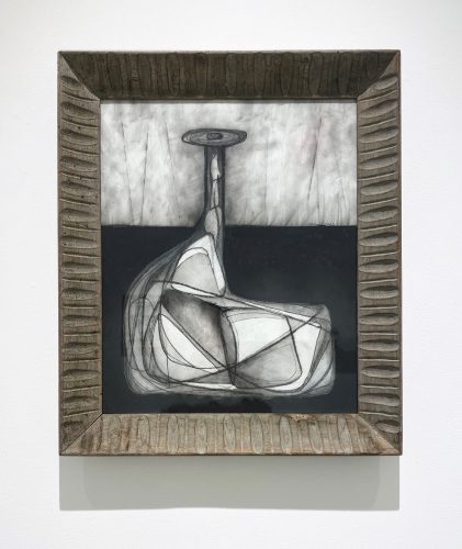 A framed piece of art on a wall Description automatically generated