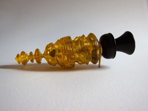 A close-up of a chess piece Description automatically generated