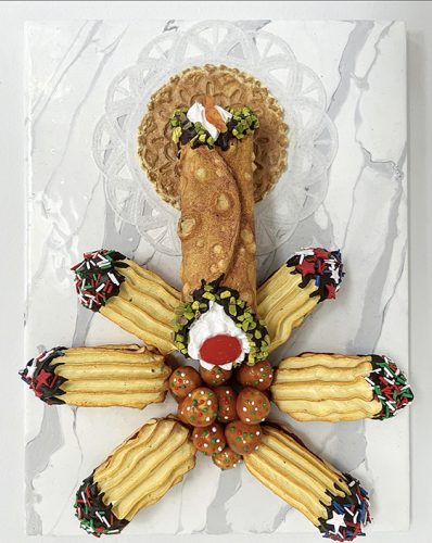 A plate of food on a white surface Description automatically generated