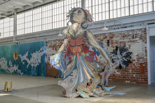 A large piece of art in a room Description automatically generated