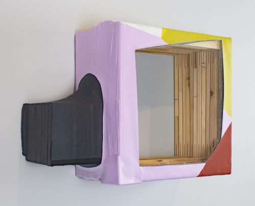 A rectangular box with a window Description automatically generated