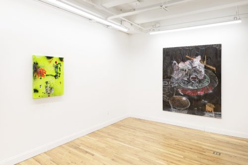 A room with paintings on the wall Description automatically generated