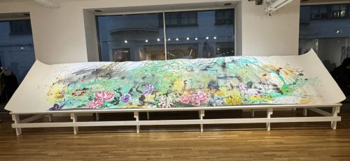 A bench with a painting on it Description automatically generated