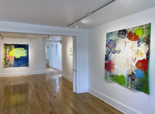 A room with art on the wall Description automatically generated