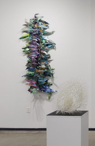 A sculpture on the wall Description automatically generated