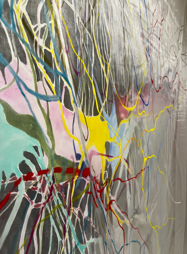 A colorful painting on a wall Description automatically generated