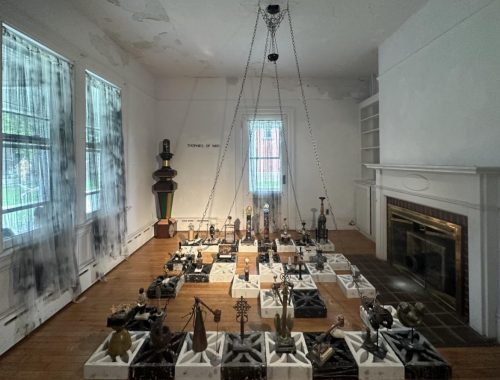 A room with a large chess board Description automatically generated