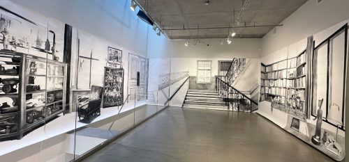 A room with a drawing of stairs and stairs Description automatically generated