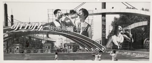 A black and white photo of men drinking from a bottle AI-generated content may be incorrect.