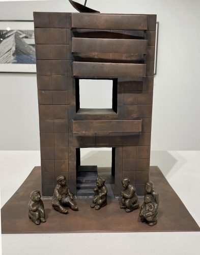 A sculpture of a building AI-generated content may be incorrect.