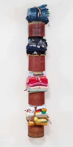 A stack of clothes on a pole AI-generated content may be incorrect.