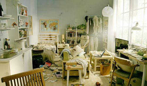 A nice room with furniture and a table AI-generated content may be incorrect.